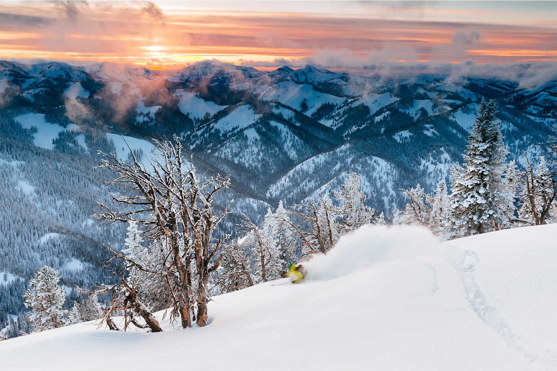 overlooking grand teton snow cap mountains