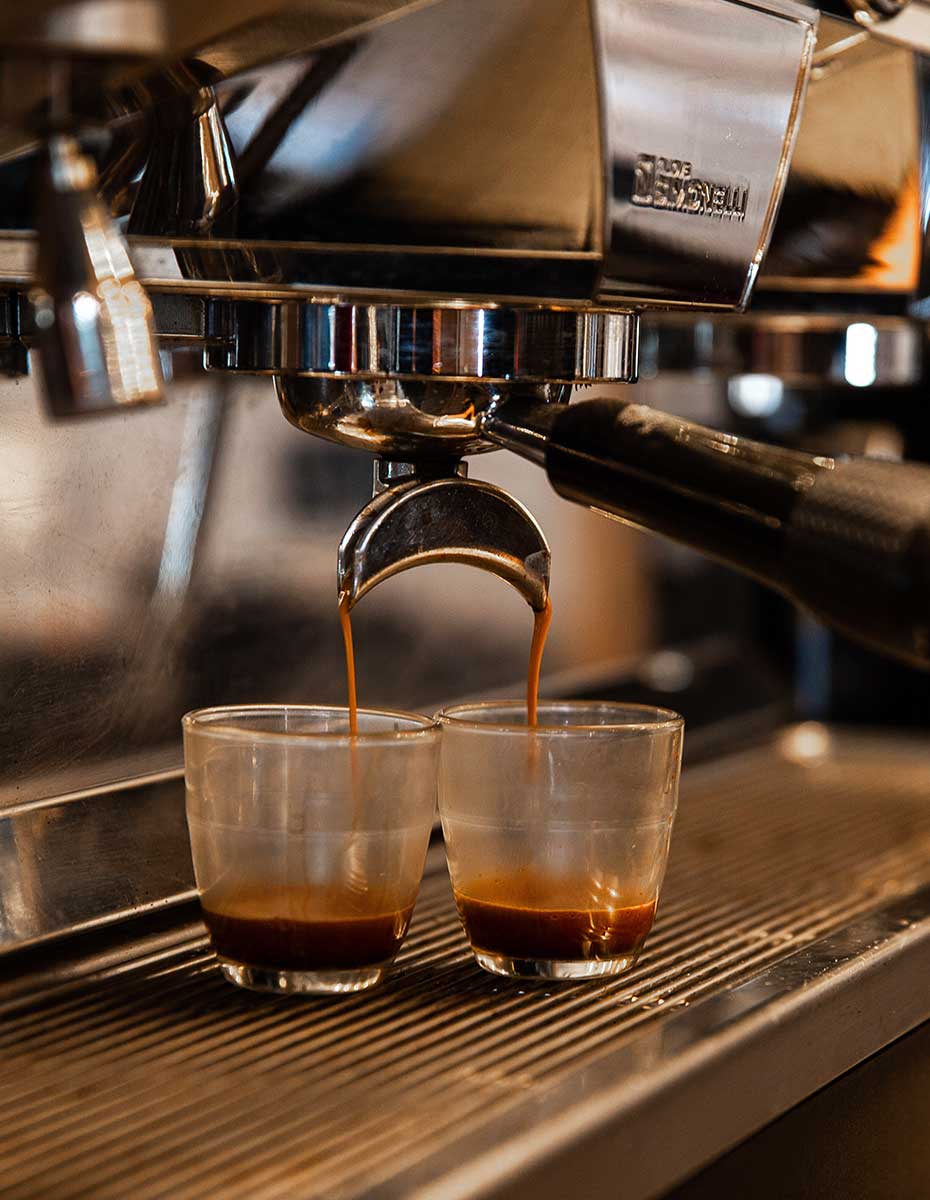 Espresso being poured into glasses